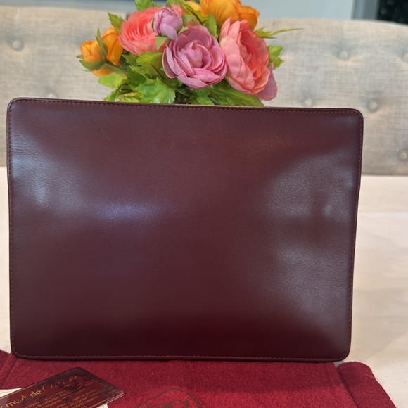 Authentic Cartier clutch bag with authenticity card